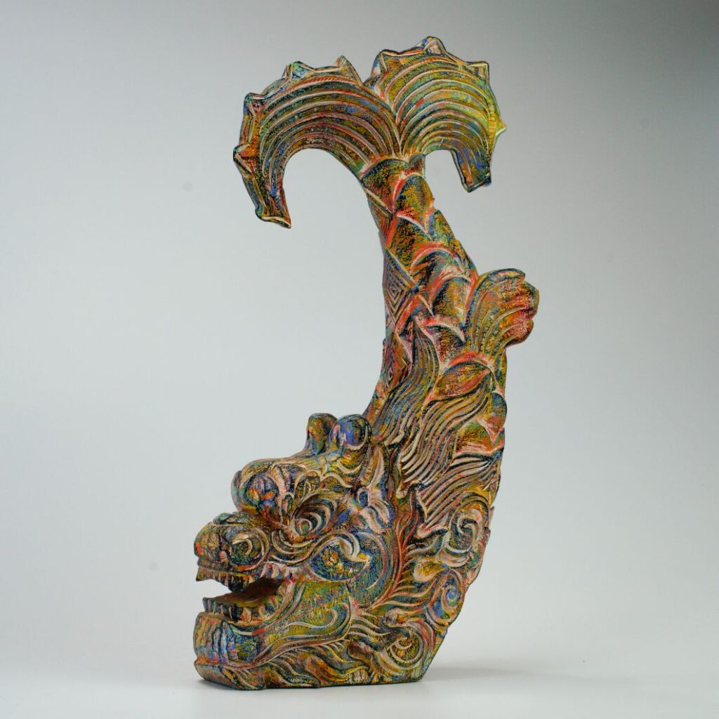 Carp transforming into dragon sculpture by artist Le Ngoc Thuan, part of the Cui Lu Collection, Hoi An, Vietnam