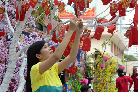 A Vietnamese woman prepares for Tet holiday in Vietnam